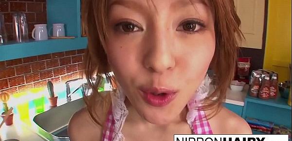  Japanese cutie gives a blowjob in the kitchen